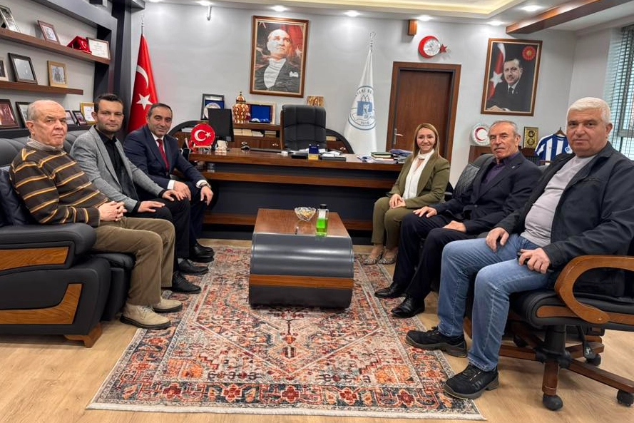 MHP heyeti Pazaryeri Belediye Başkanı Zekiye Tekin'i ziyaret etti, Cumhur İttifakı iş birliği vurgulandı.