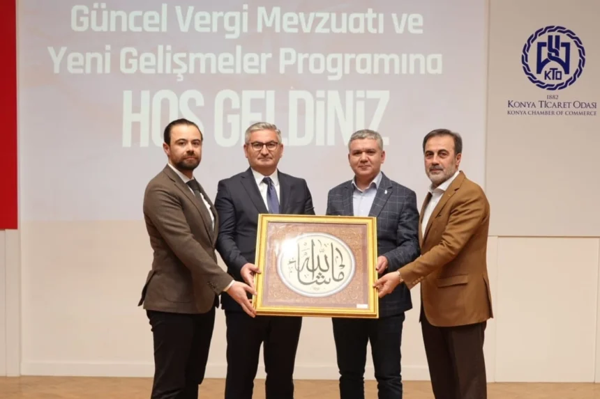 Konya'da düzenlenen güncel vergi mevzuatı seminerine katılan iş insanları